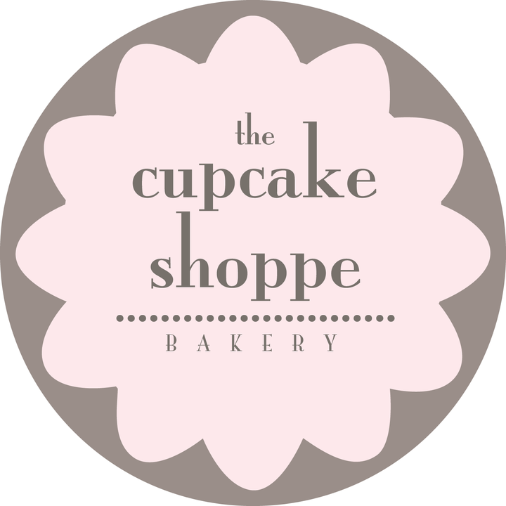 The welcoming façade of The Cupcake Shoppe Bakery in Raleigh, inviting you to discover their delicious creations.